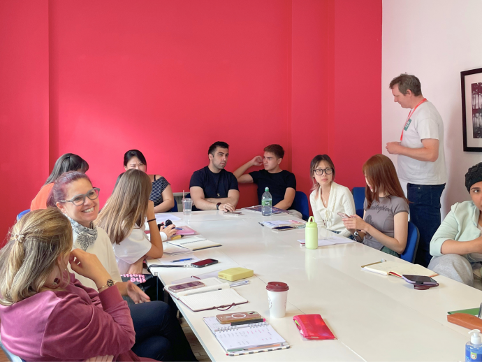 Students participating in a BBC Learning English session at LSI London, developing their English communication skills in an interactive classroom environment.
